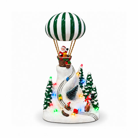 Weihnachtliche Landschaft mit fliegendem Weihnachtsmann, LED-Lichtern und Musik