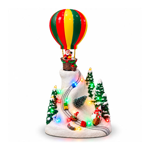 Weihnachtliche Landschaft mit fliegendem Weihnachtsmann, LED-Lichtern und Musik