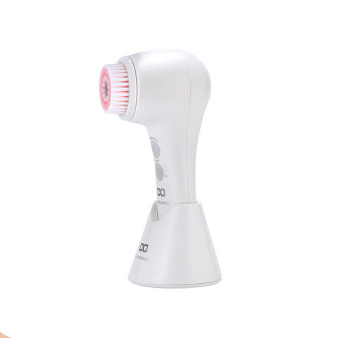 Spazzola pulizia viso elettrica bianca con testina rosa, dispositivo beauty per skincare e cura della pelle professionale