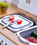immagine-2-wenko-cesta-multifunzione-pieghevole-salvaspazio-con-tappo-per-drenaggio-acqua-ean-4008069031009